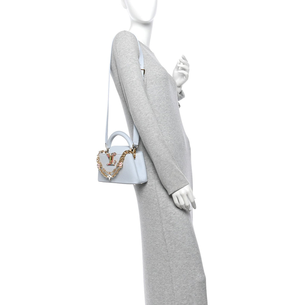 LV X TM Taurillon Capucines East West Mini Olympe Blue