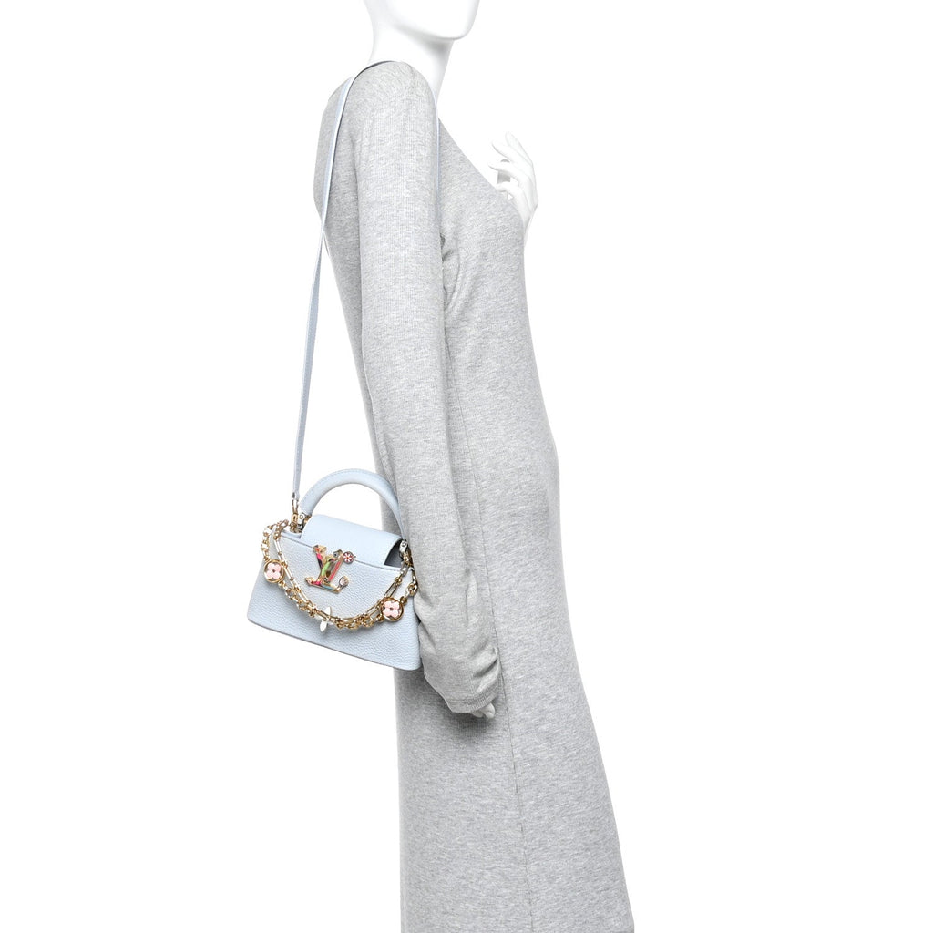 LV X TM Taurillon Capucines East West Mini Olympe Blue