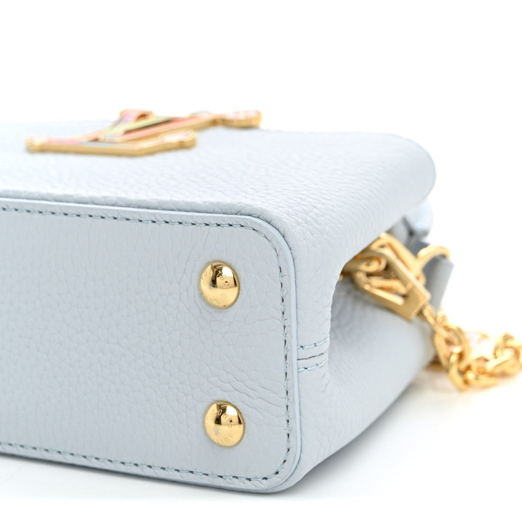 LV X TM Taurillon Capucines East West Mini Olympe Blue